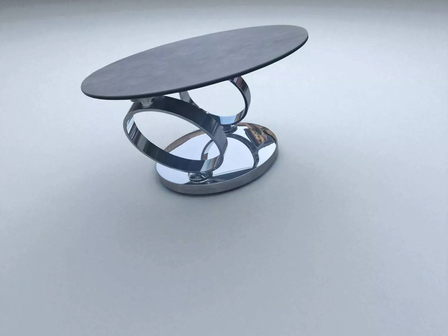 Page 1 of 8 Olympe table with swiveling glass and grey ceramic tops