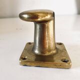 Pair of golden cast iron hooks