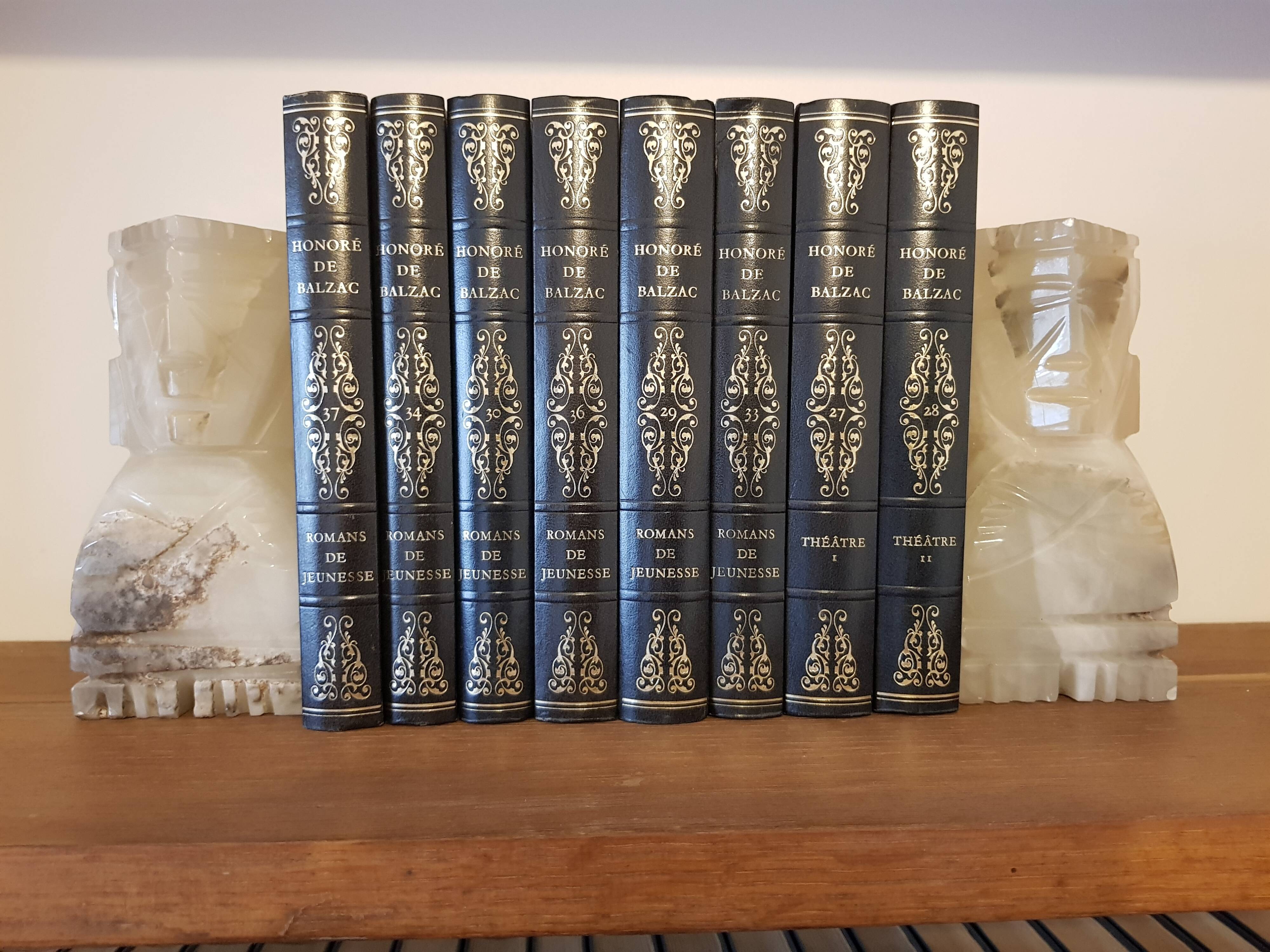 Onyx book clambands depicting an Aztec statue