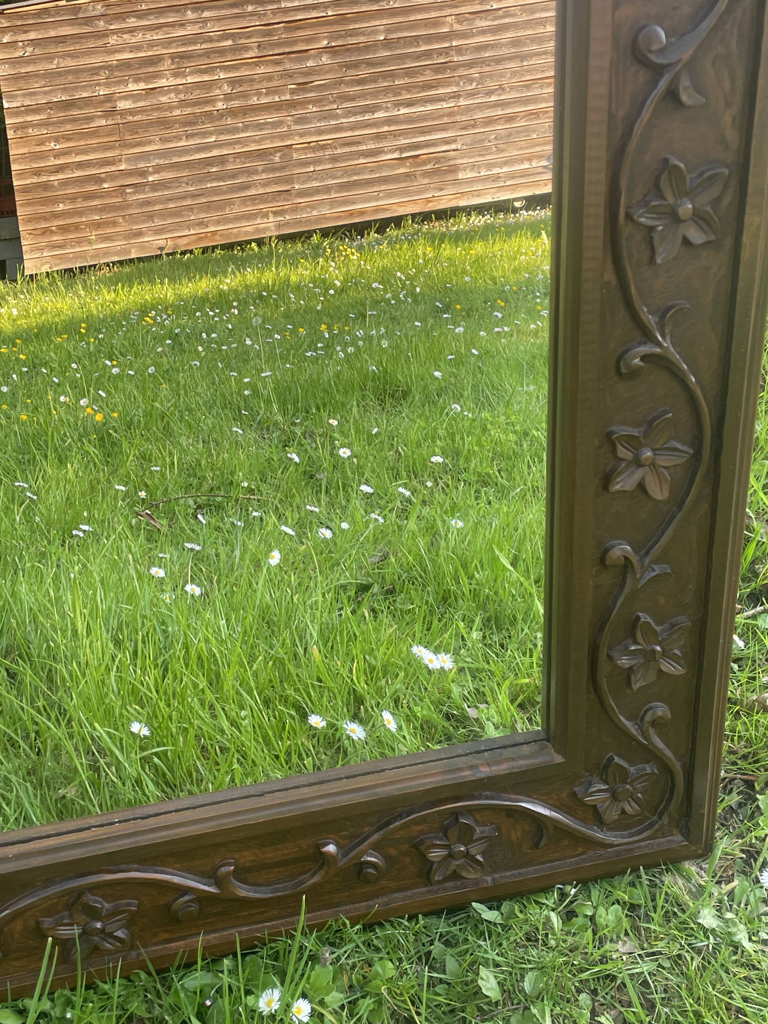 Large carved wooden mirror in Art Nouveau style