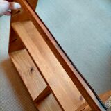 Wooden shelf with unroller wipes everything