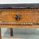 brutalist wooden table
