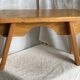 Rustic stool with compass legs, mountain furniture