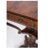 Antique mahogany sewing table on a pillar from around the year 1840s