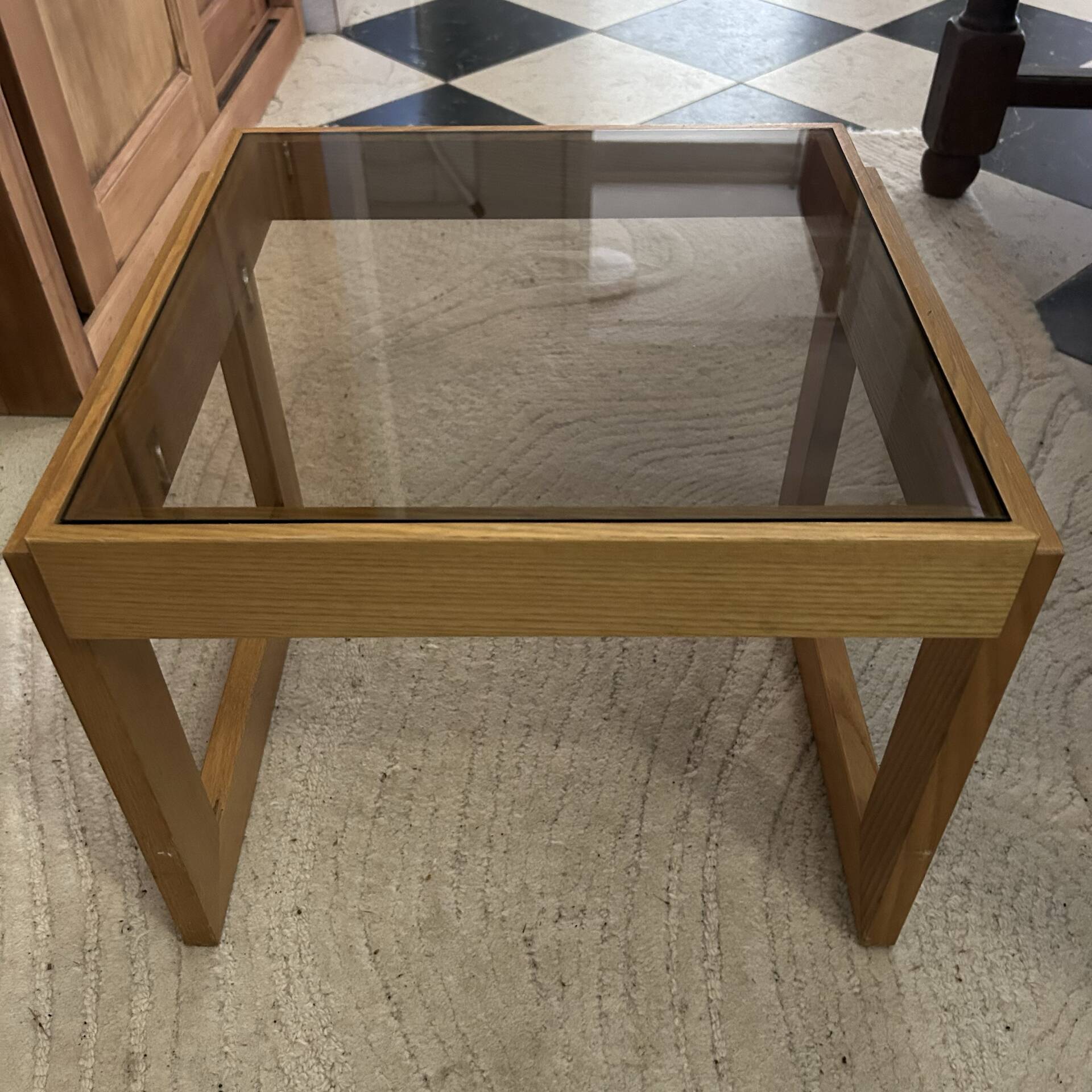 Modernist side table in wood and smoked glass