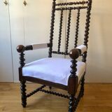 Fauteuil à haut dossier de style Louis XIII