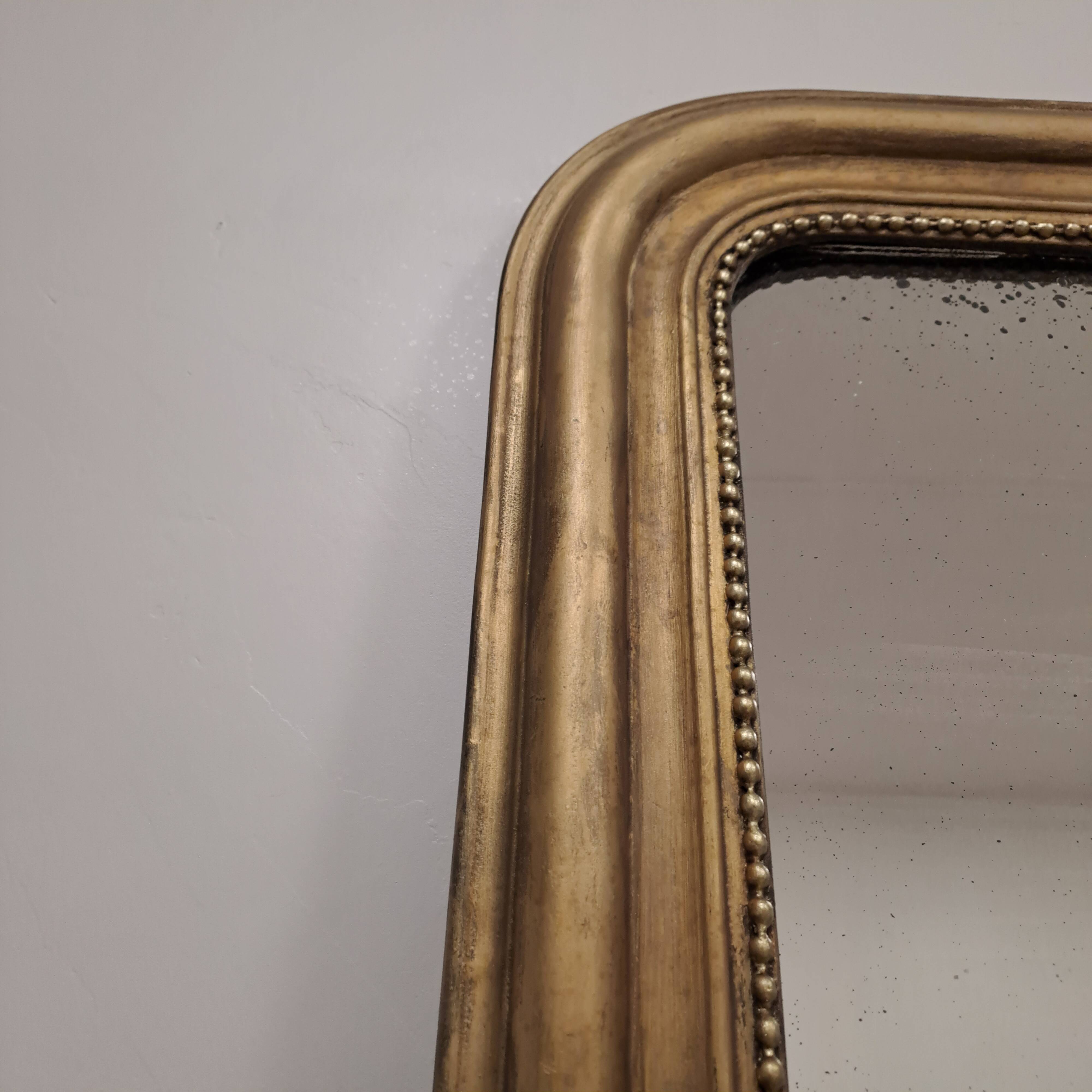 Large antique Louis Philippe gilded mirror