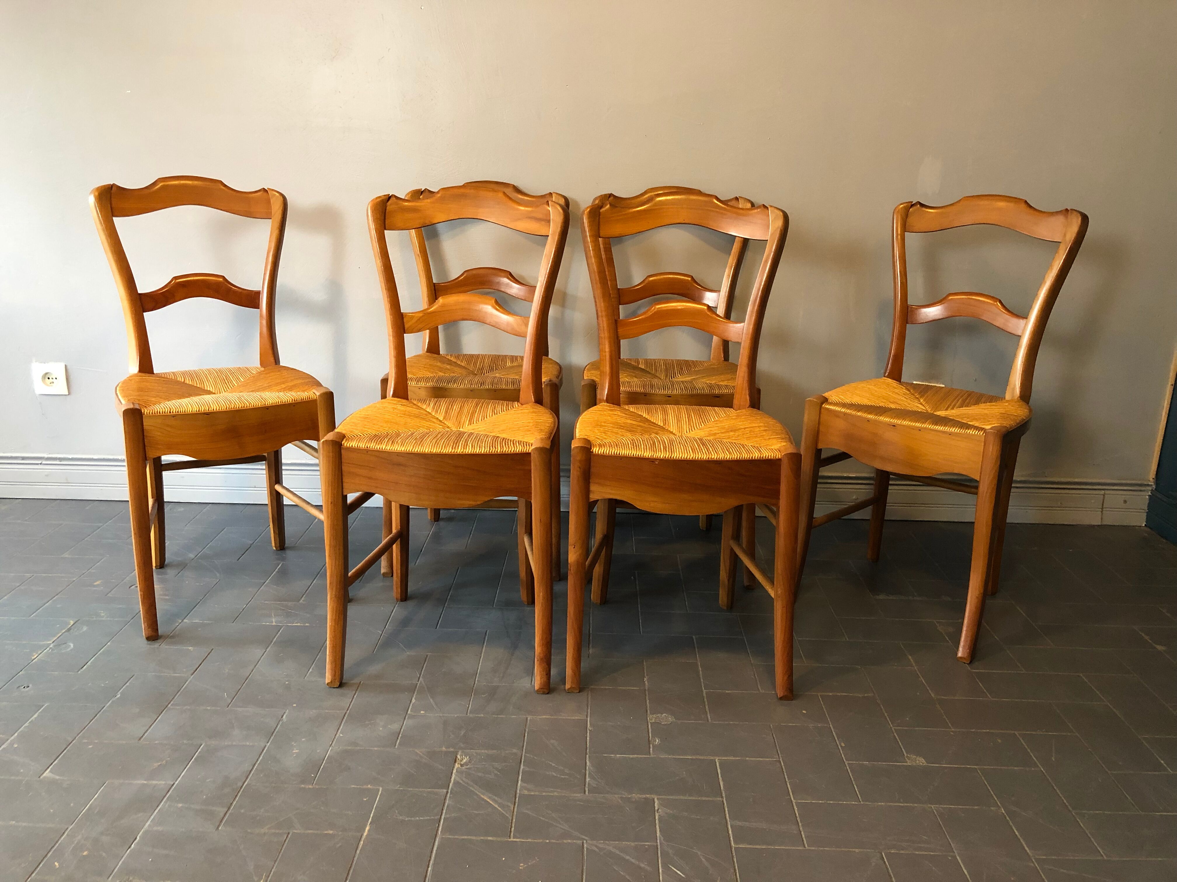 6 old chairs in cherry tree