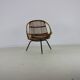 Three legged dutch design rattan easy chair by D. van Sliedregt