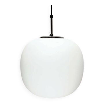 Minimalist suspended glass ball lamp from the vintage German space age by Glashütte Limburg, 1970s.