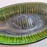 Accolay's green ceramic canoe cut