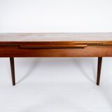 Dining table in teak with extensions of danish design from the 1960s