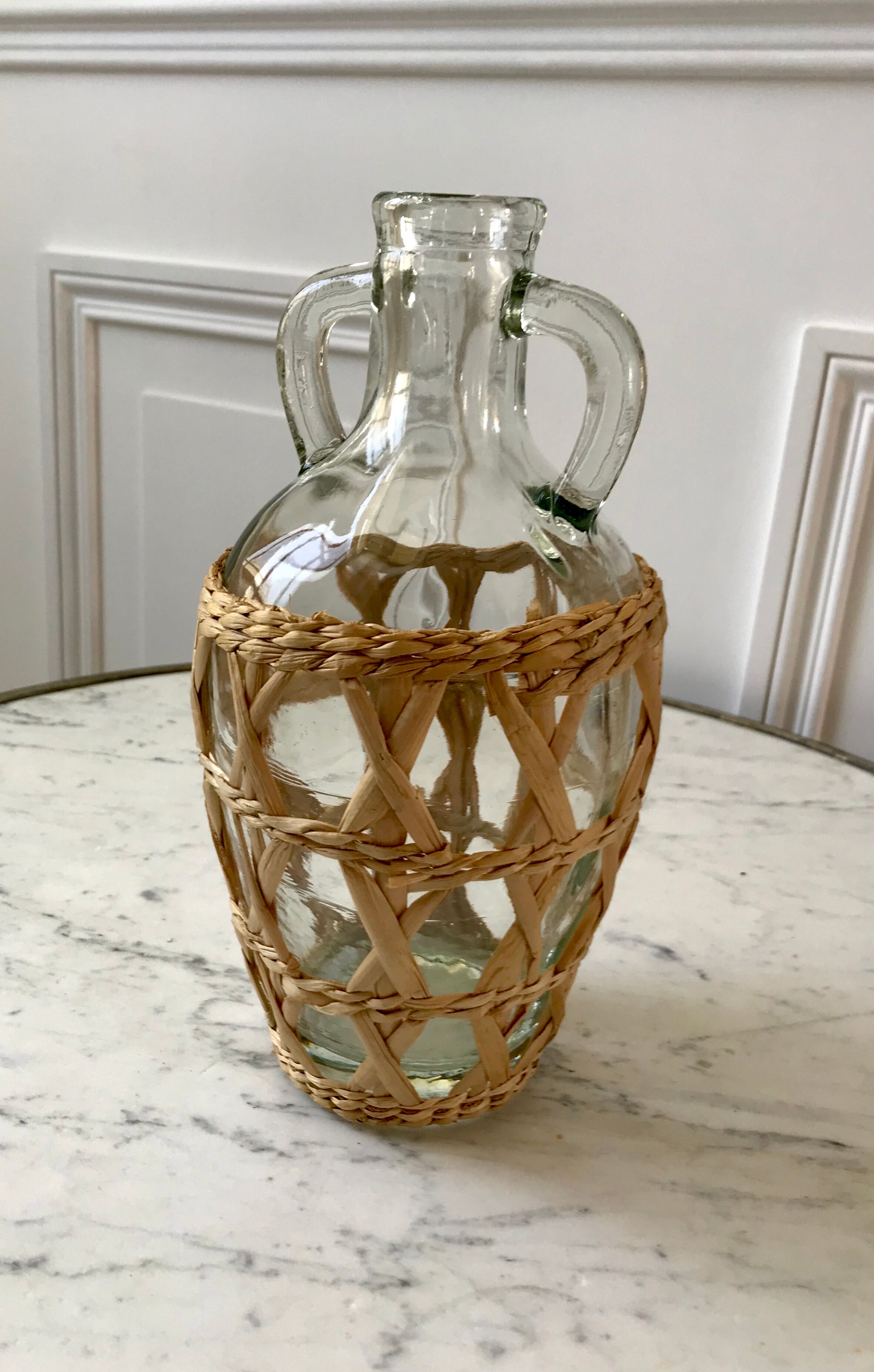 Bottle with handle and covered with wicker / rattan 70s