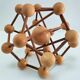 Sculptural modeling of a solid wood atom contemporary design