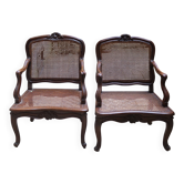 Paire des Fauteuils style Louis XV en bois et cannage