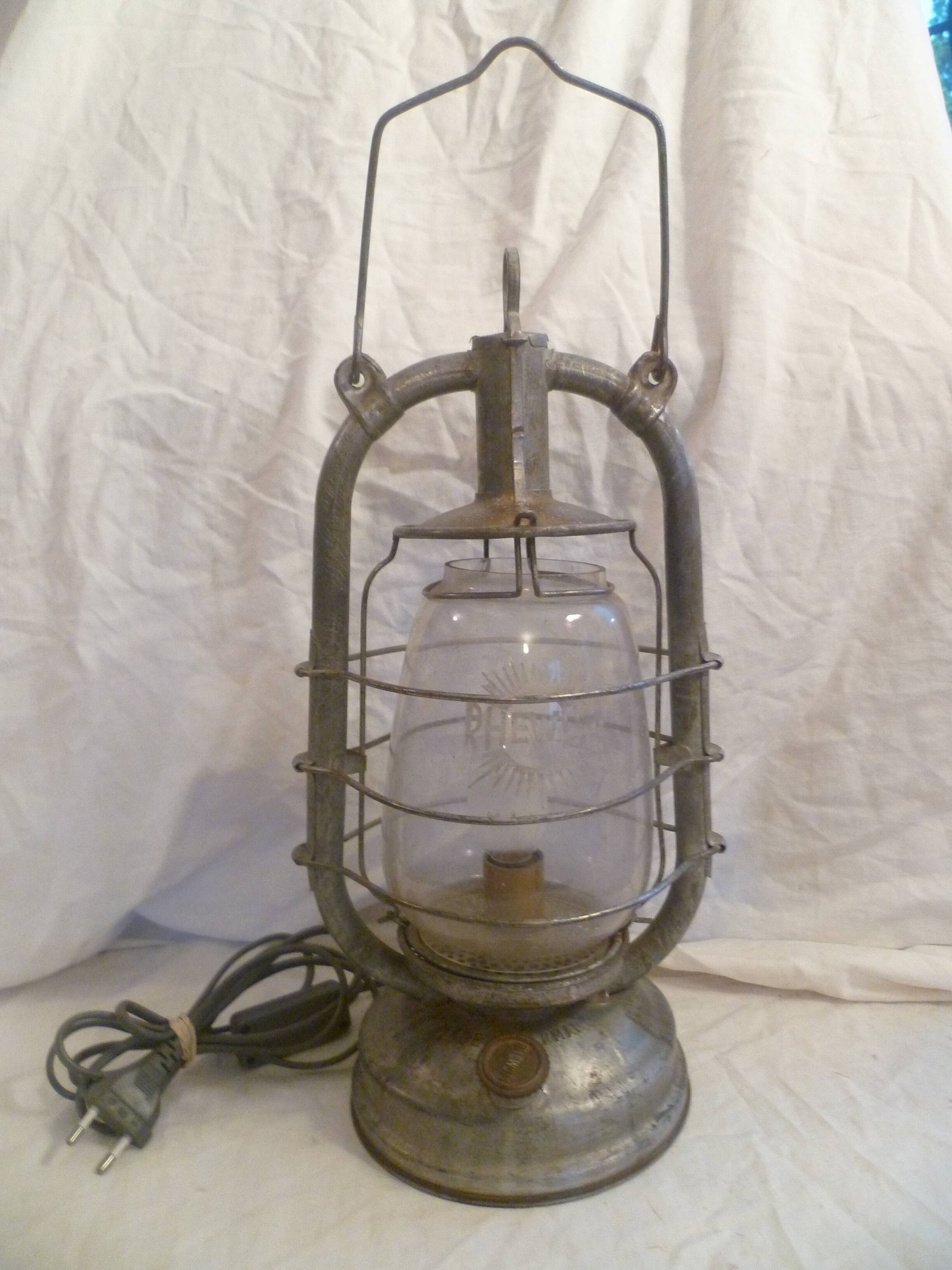 Vintage glass/metal storm lamp from the brand: rhewum germany