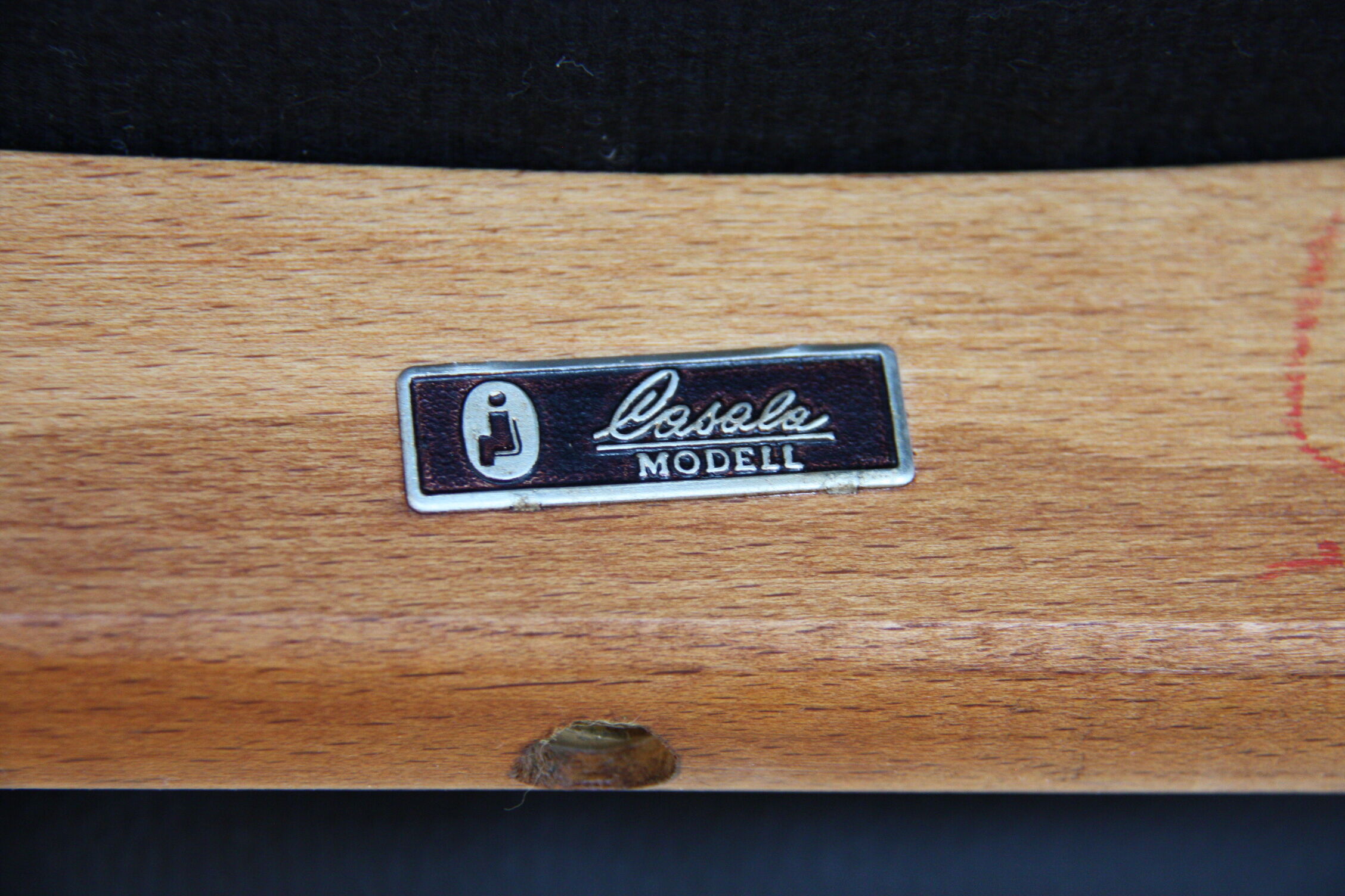 Vintage armchair in teak and black leather model Casina 60s