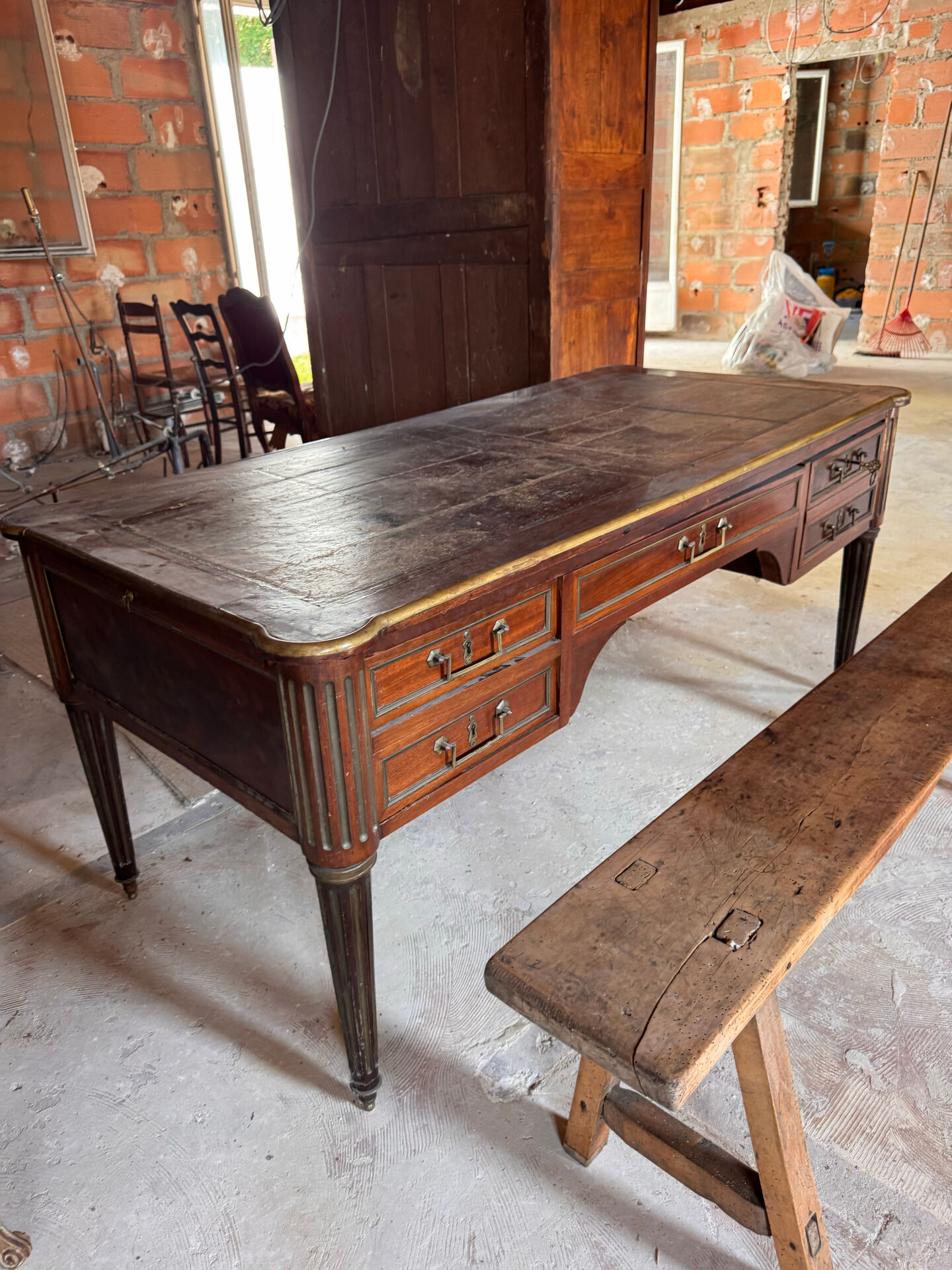 Large flat desk in Louis XVI style made of mahogany, early 20th century.