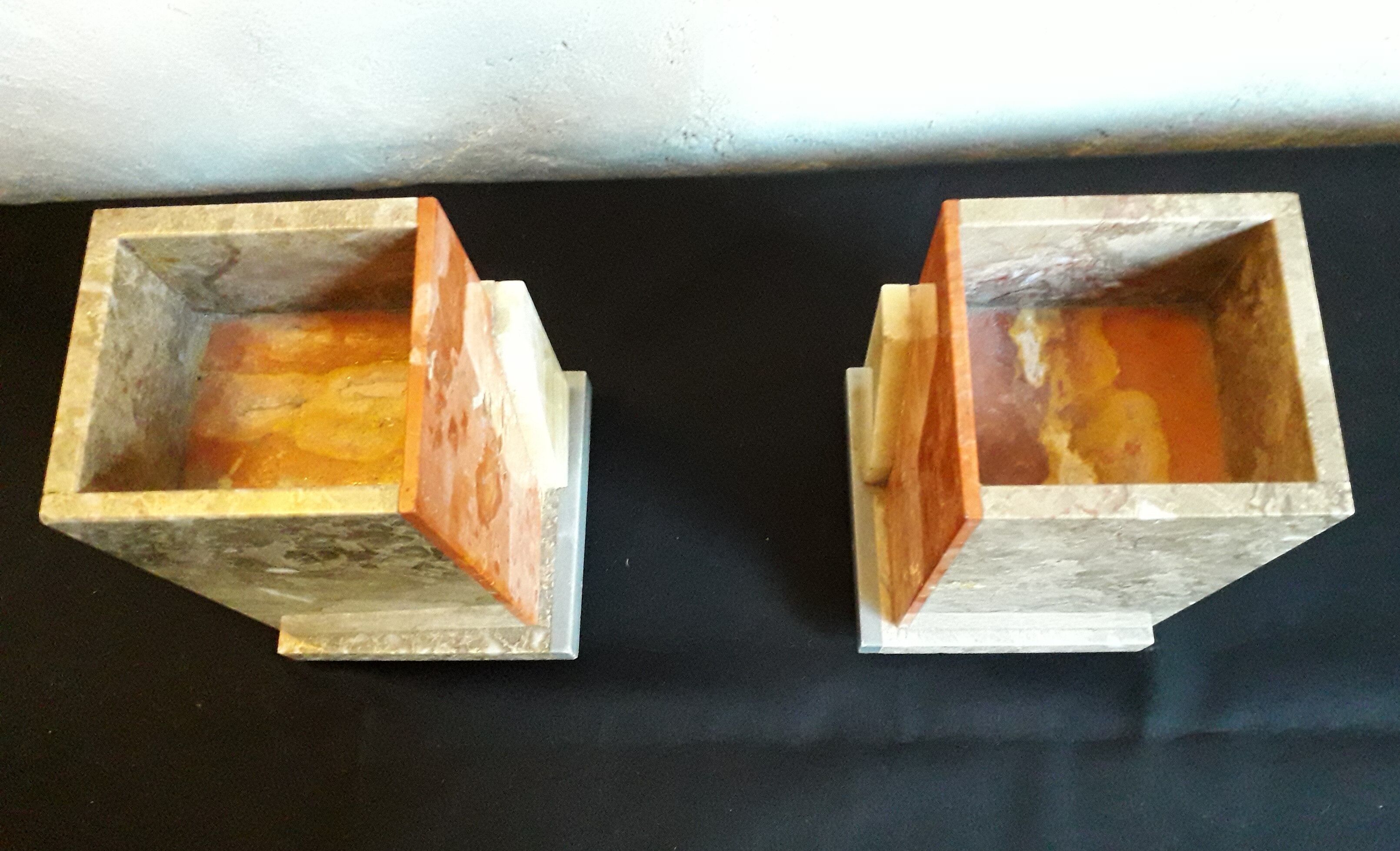 Pair of marble and onyx book clamts