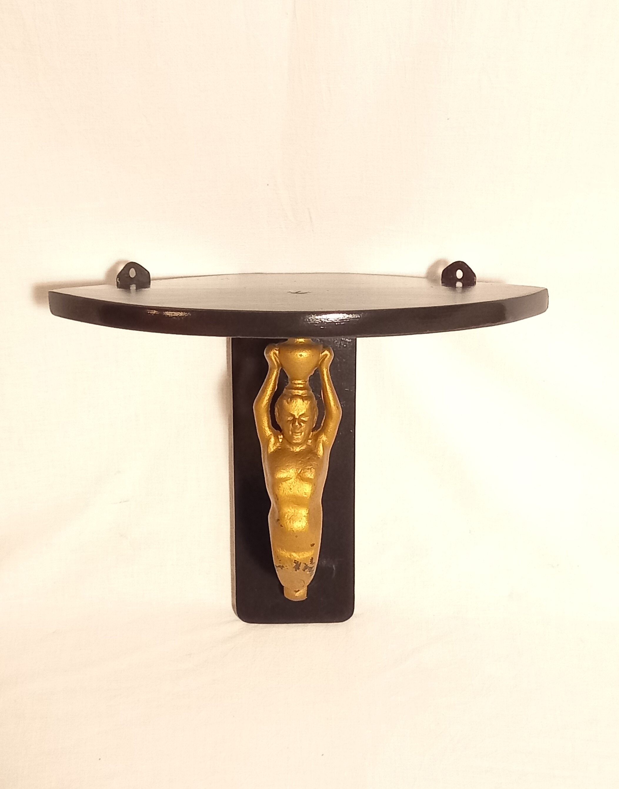 Corner wall lamp console with a golden cast iron djinn