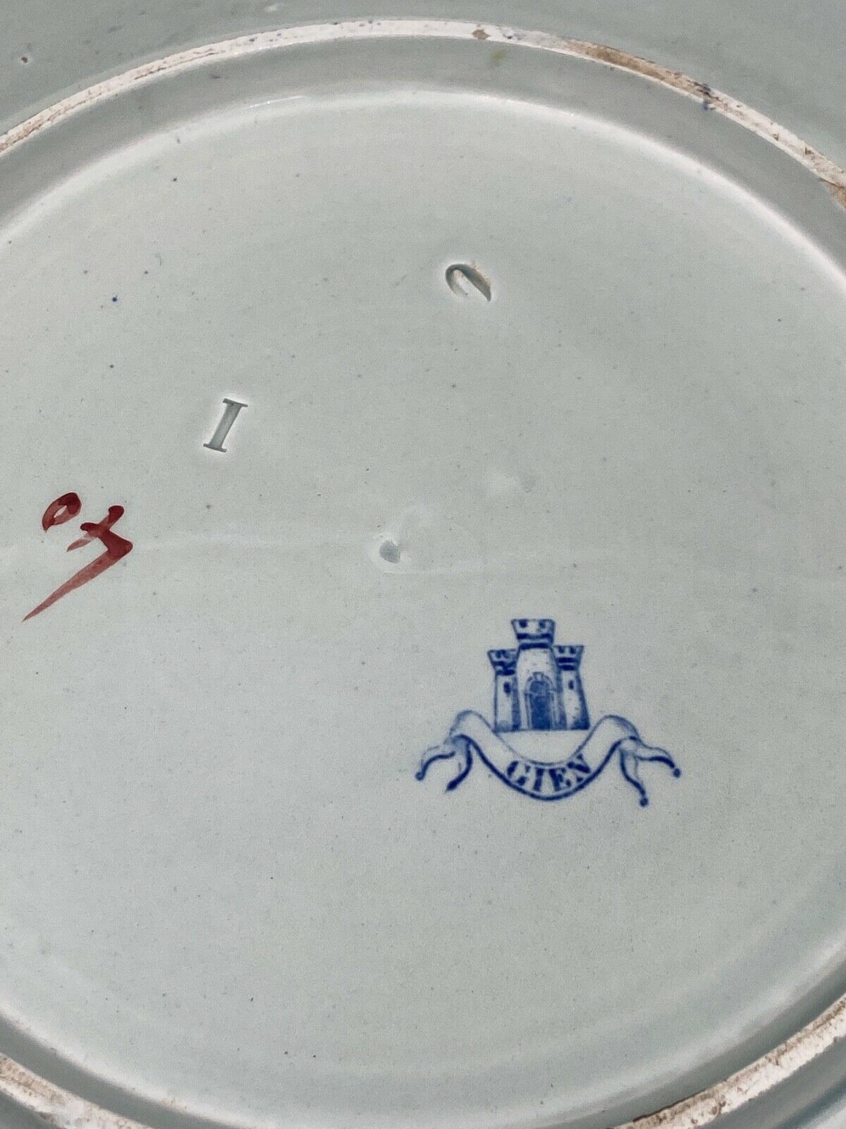 Plate gien with cornucopia decoration insect peacock butterfly