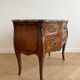 Curved Louis XV commode in rosewood and marble