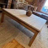Large square antique coffee table made of raw solid wood.