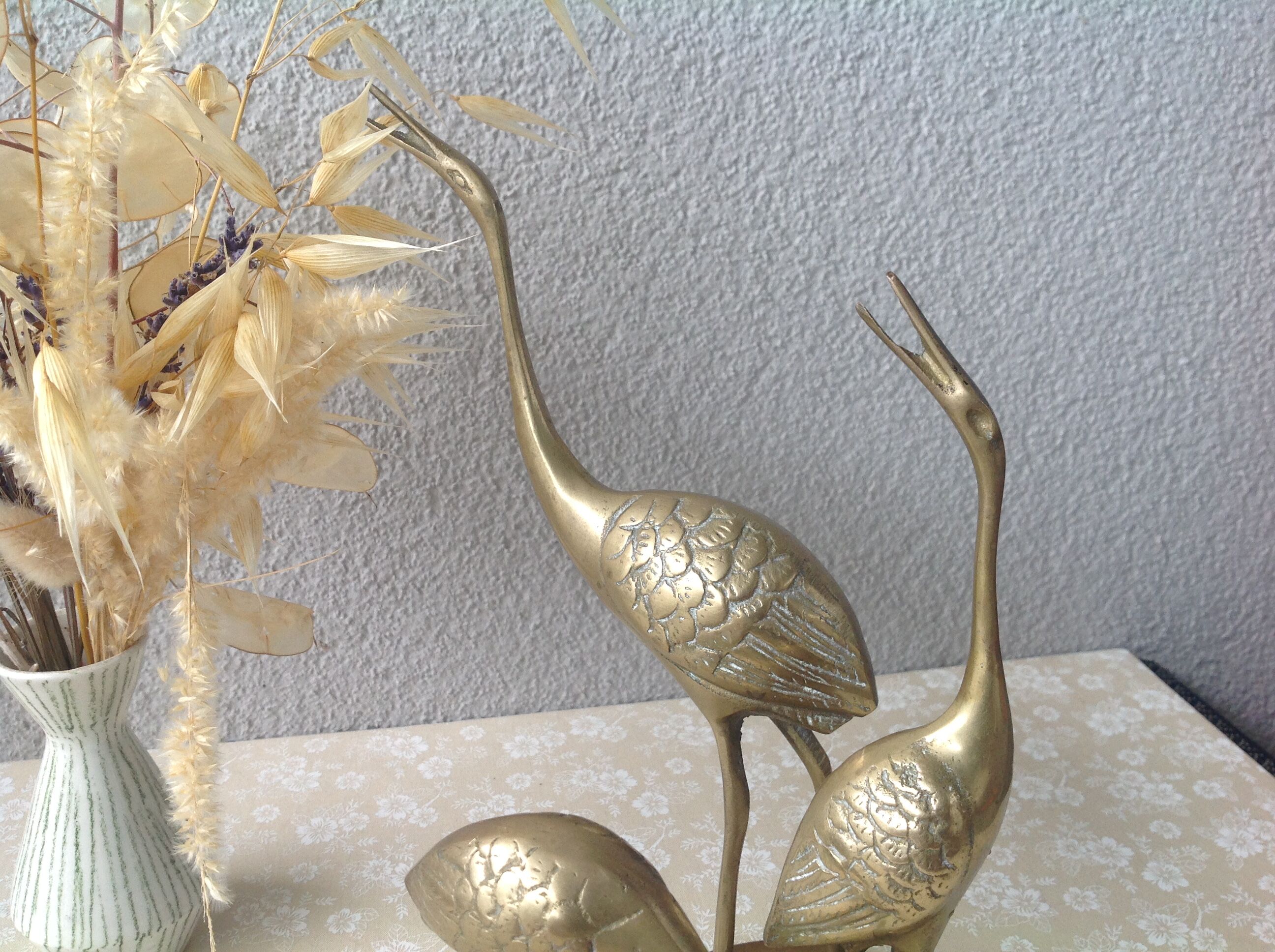 Golden brass herons