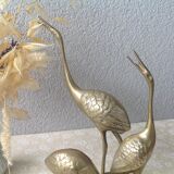 Golden brass herons