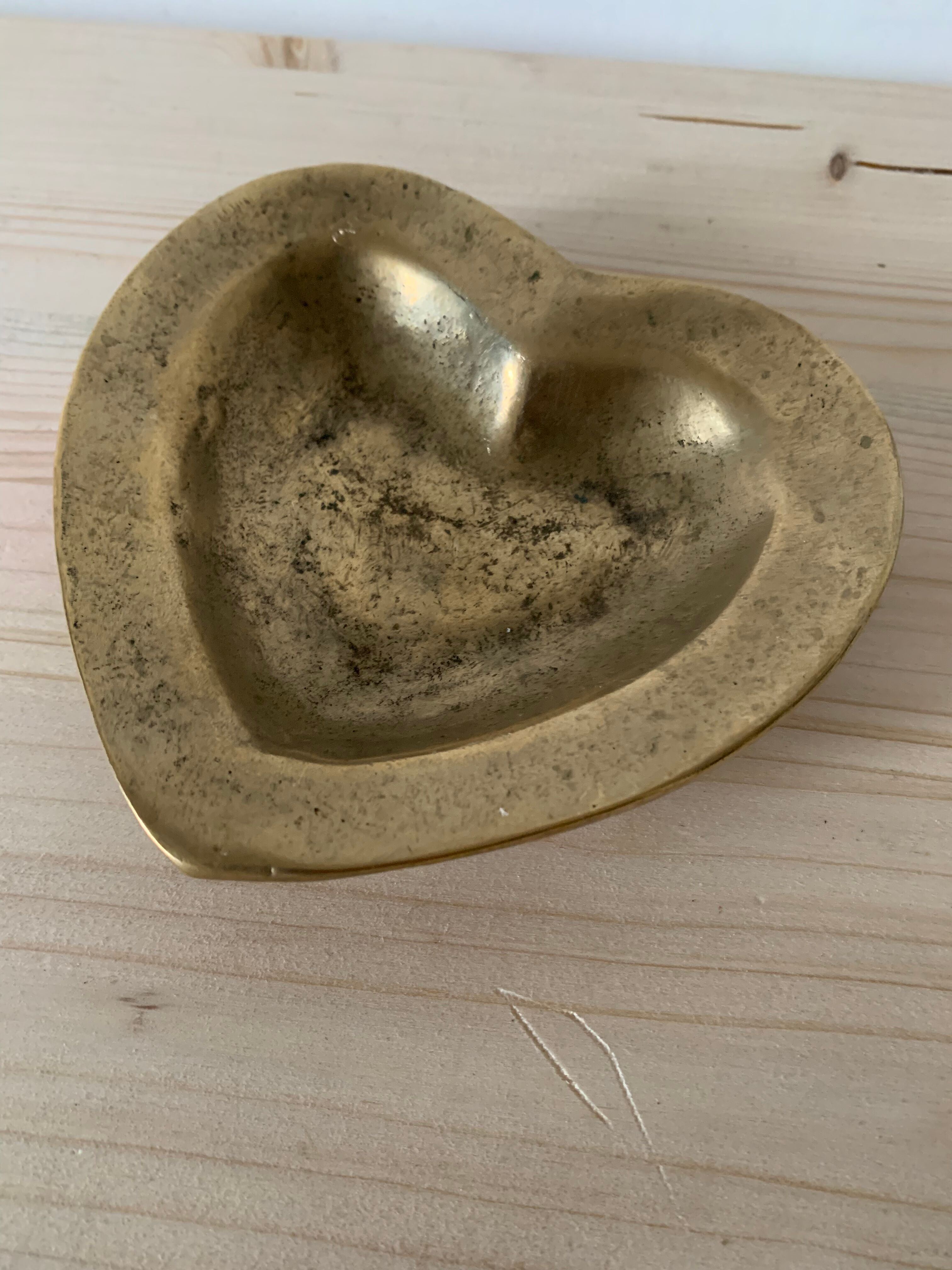 Empty bronze heart pocket