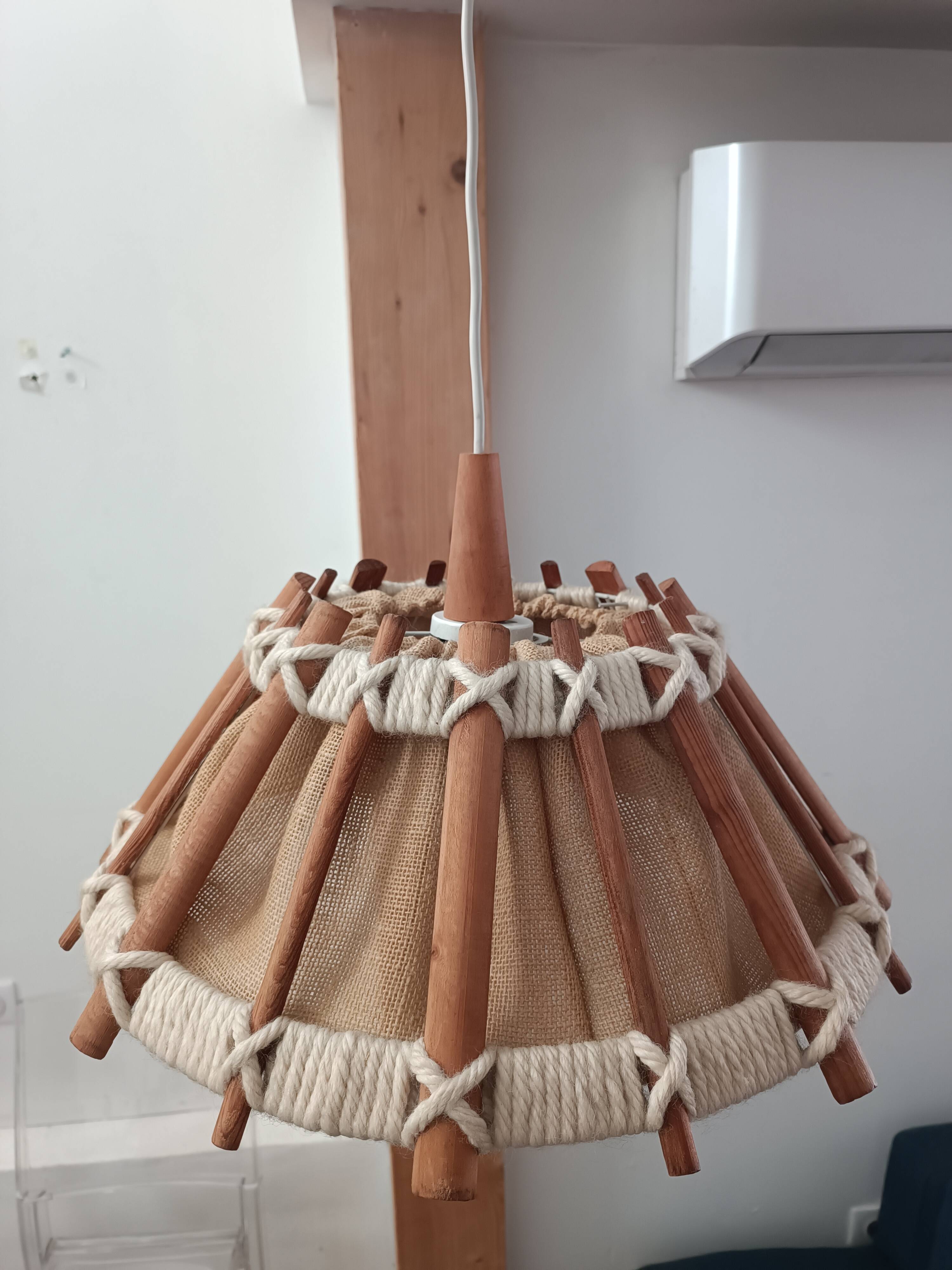 Hanging lamp with wood and cord from the 1990s.