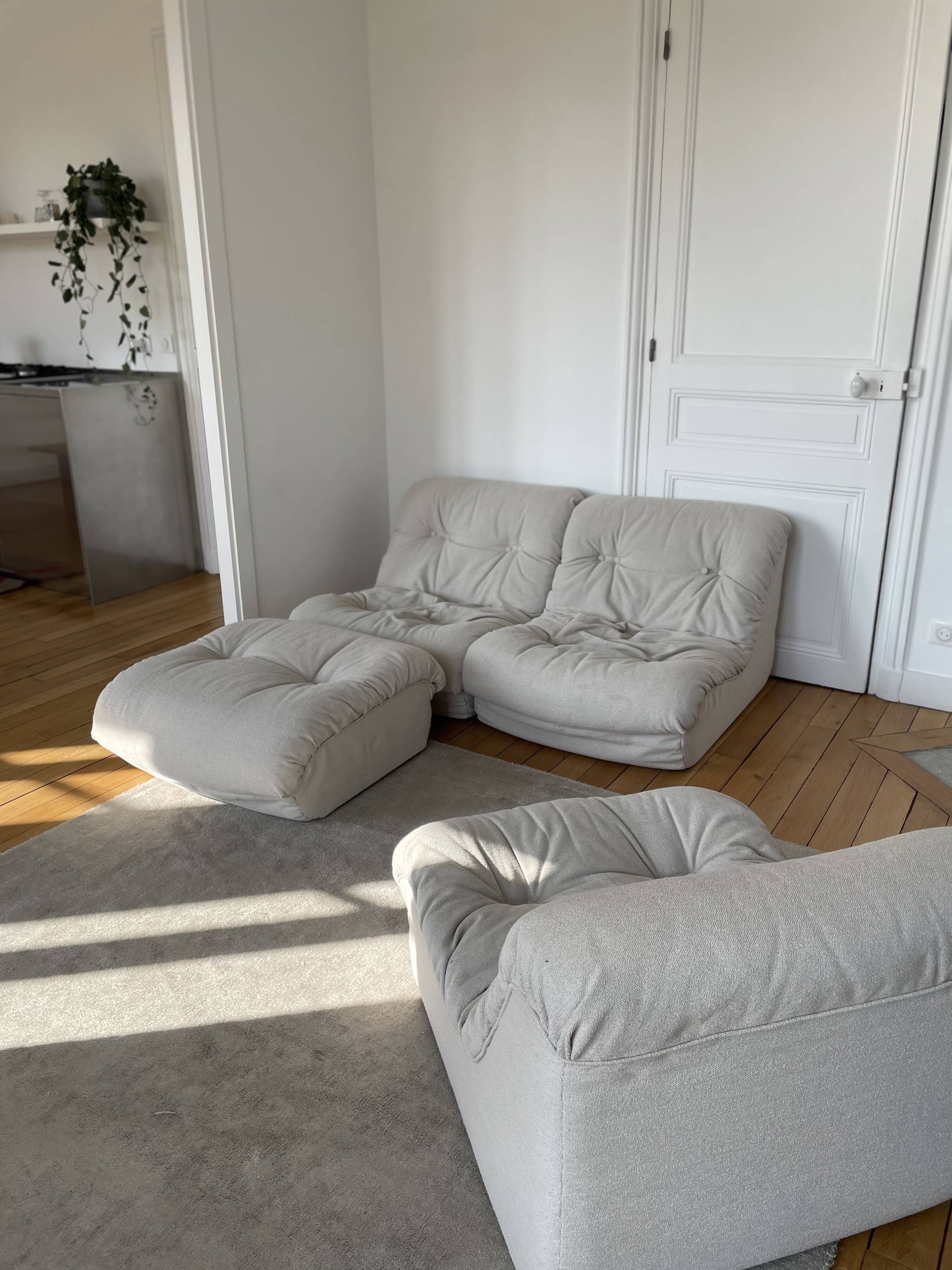 Modular sofa with 3 armchairs and an ottoman.