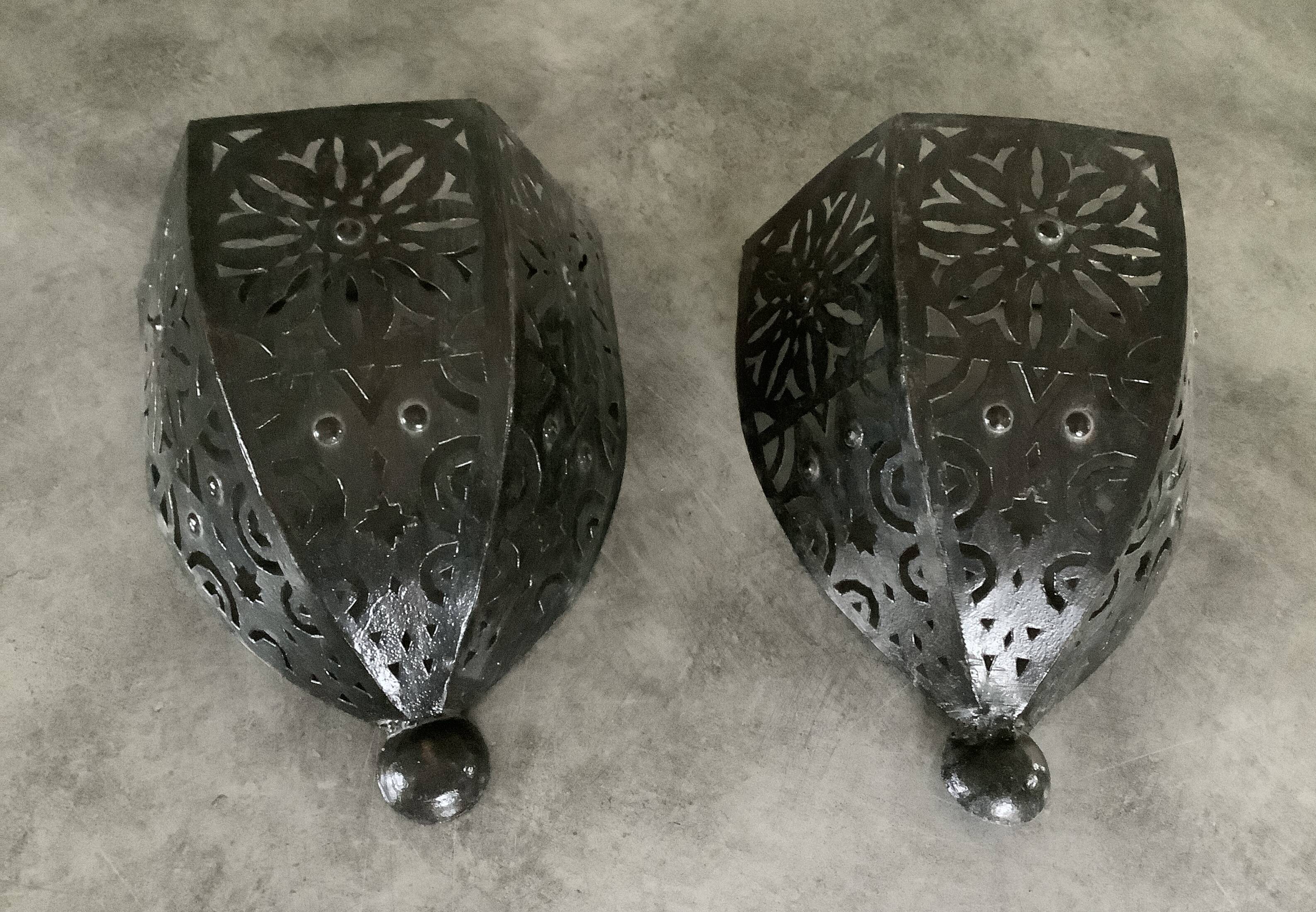 Pair of Wall Sconces in Iron with Cut-Out Patterns