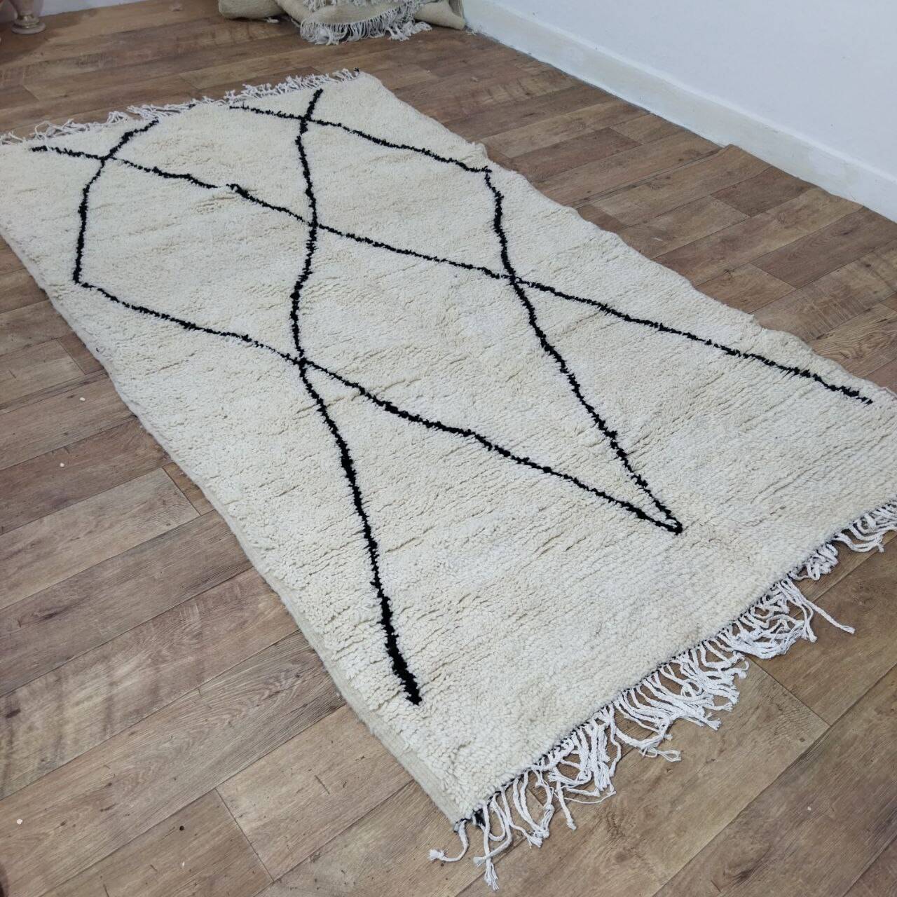 Handcrafted moroccan berber rug 243 x 143 cm