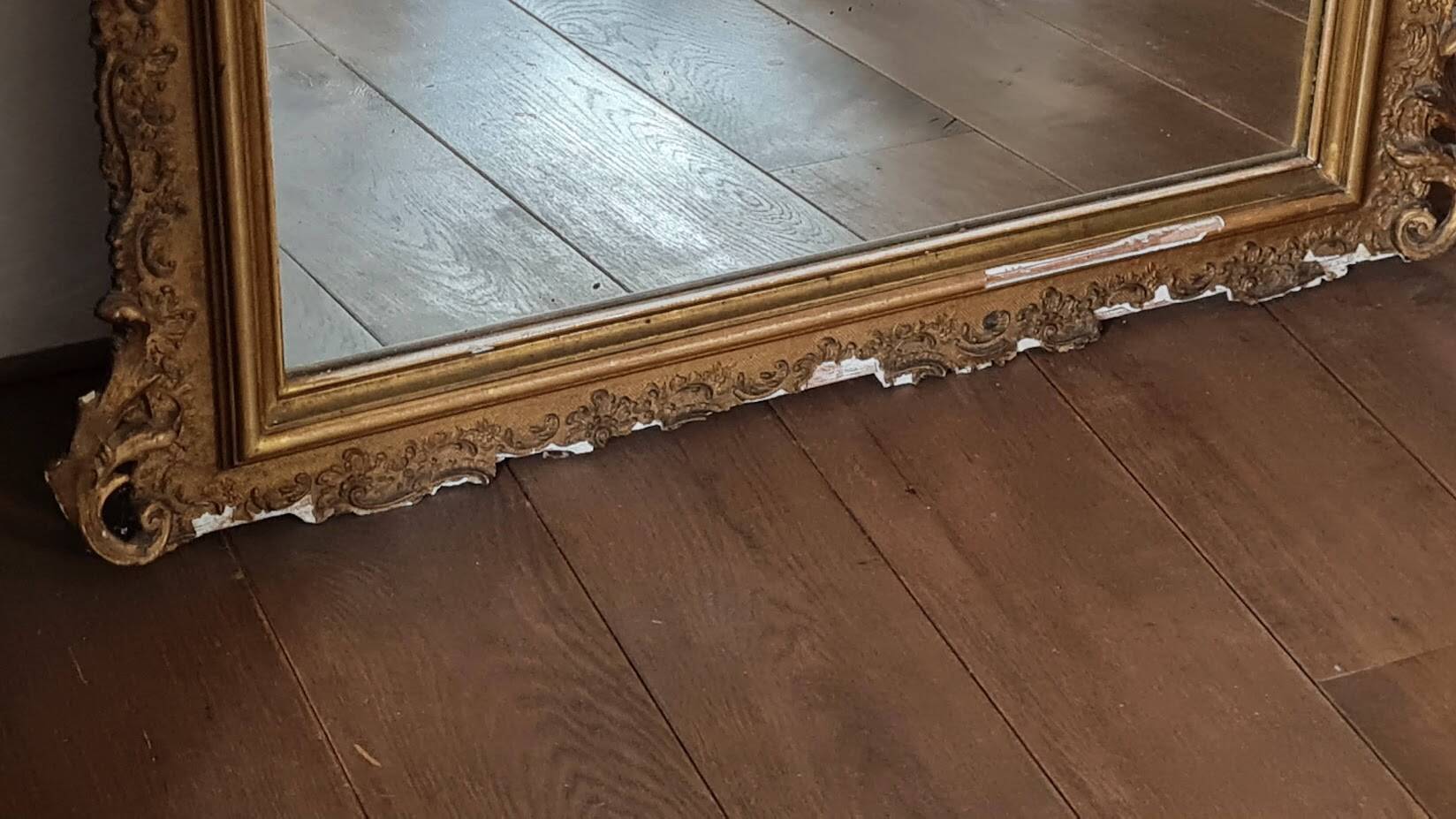 Antique Louis Philippe mirror with a pediment.