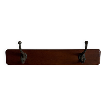 Scandinavian coat rack in solid teak from the 1970s.