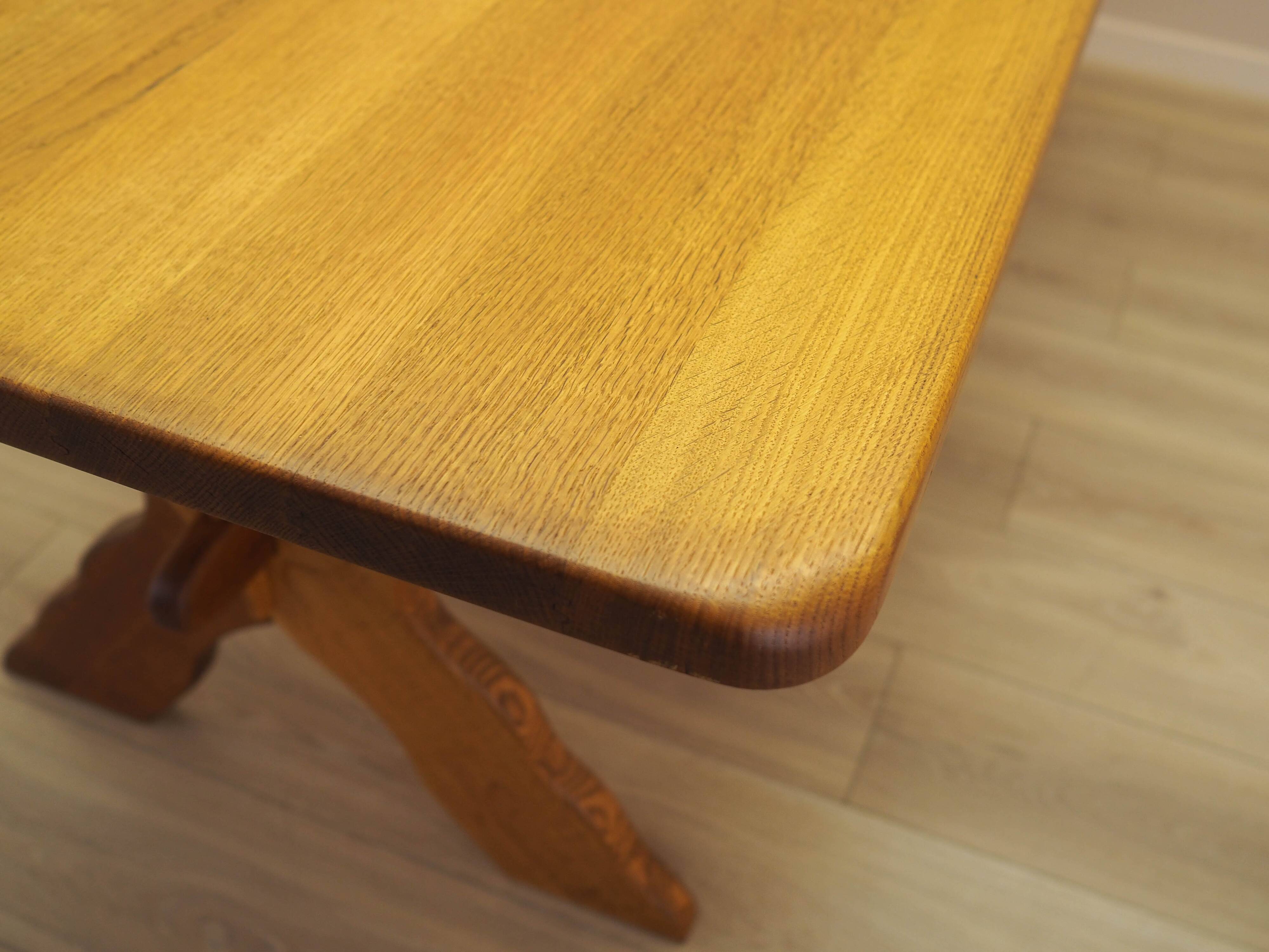 Solid oak dining table by Henning Kjærnulf, Denmark, 1960s