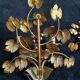 Stunning vintage wall lights in gilded iron with vine and grape decor from Italy.