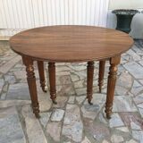 Round table 6 feet 3 solid walnut extensions