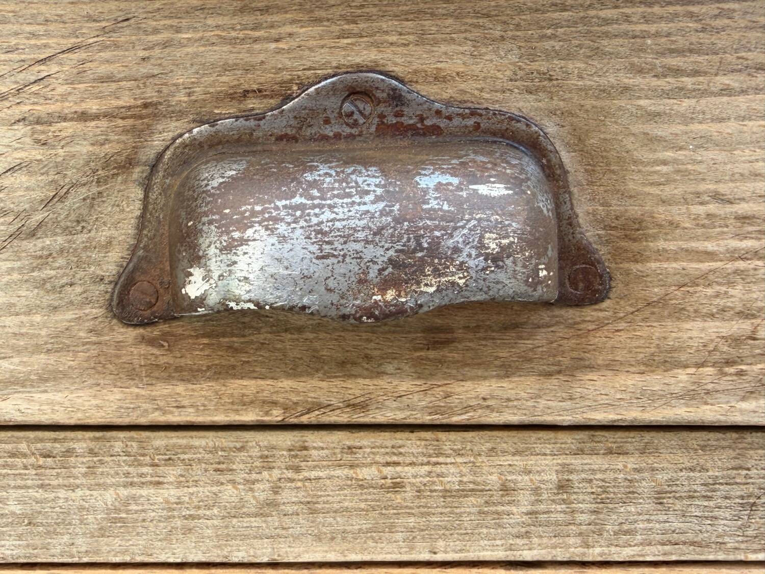 Antique patinated Parisian buffet with shell handles.