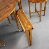 Restored Danish folding teak table with three nesting chairs by Poul Hundevad