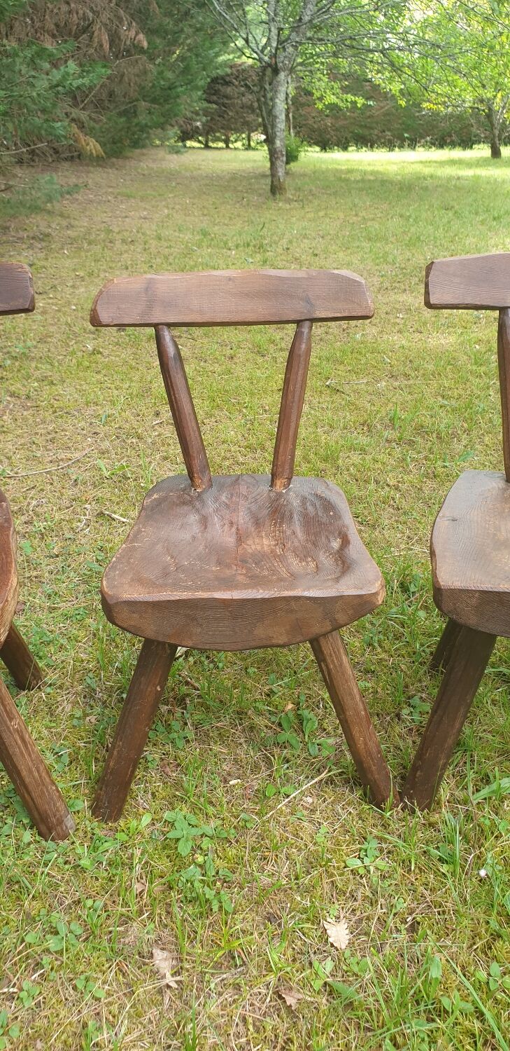 Four chairs and brutalist coffee table