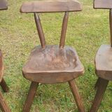 Four chairs and brutalist coffee table