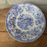 Ancienne assiette creuse motif floral bleu avec scène galante