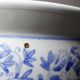 Vintage Chinese cache-pot in blue and white porcelain with a floral design.
