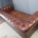Brown leather chesterfield sofa