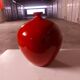 Vase rouge en céramique émaillée