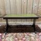 English Regency coffee table, mahogany & green stamped leather with gold.