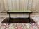 Table basse Régence anglaise, acajou & cuir vert estampé or