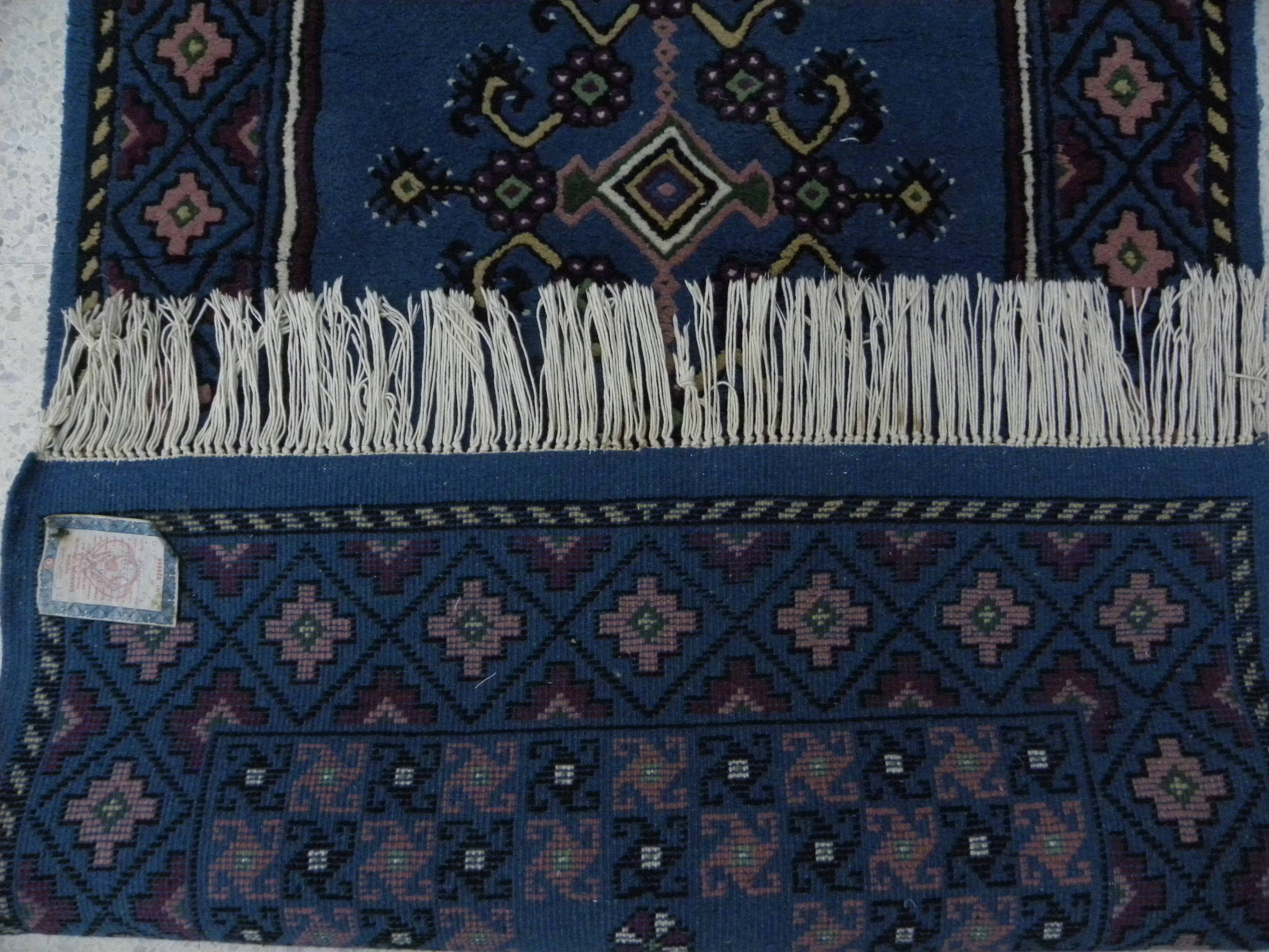 Vintage traditional Tunisian oriental rug in handmade blue wool.